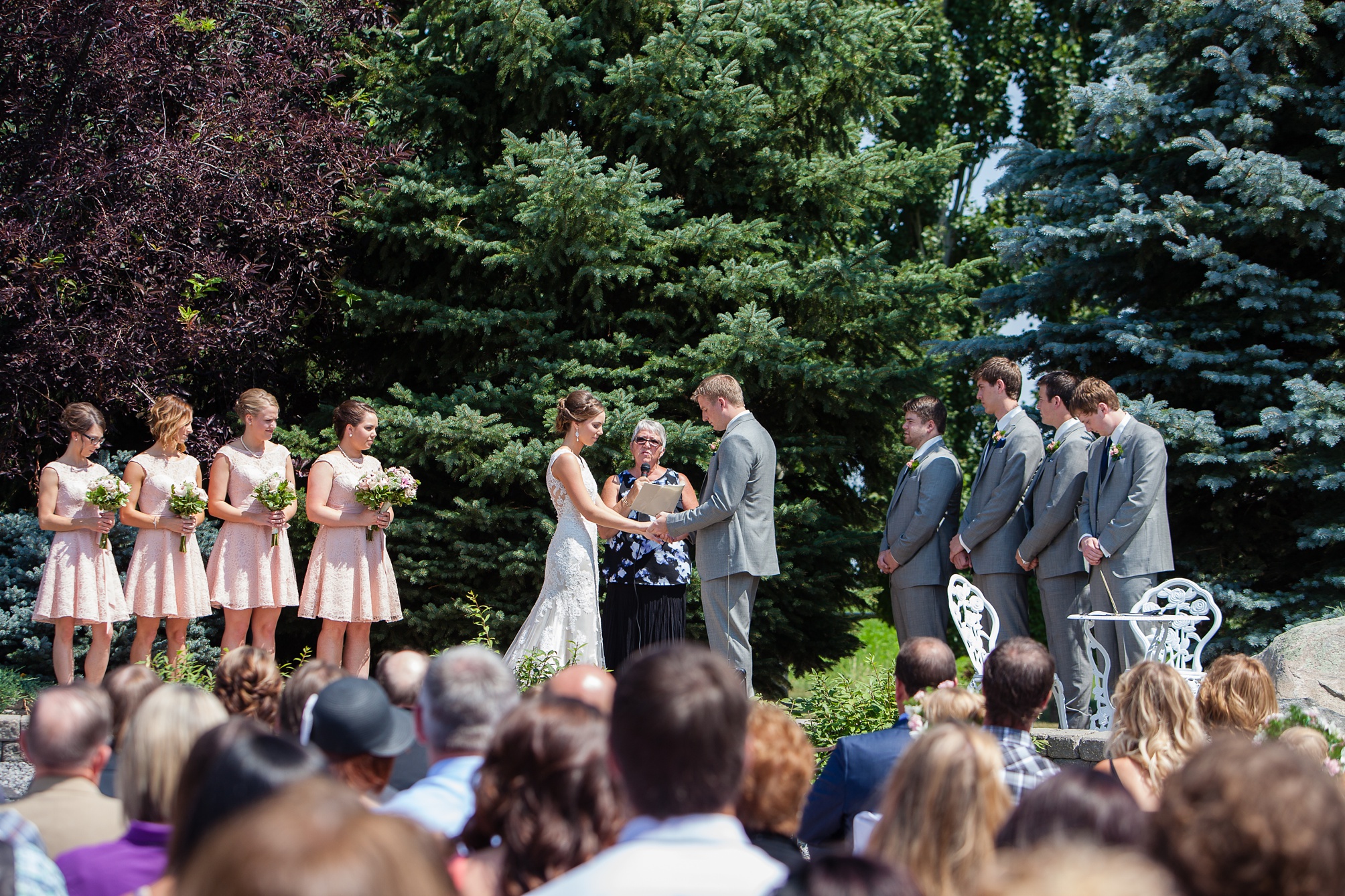 Ben and Lachelle's classy blush pink and navy blue outdoor summer wedding