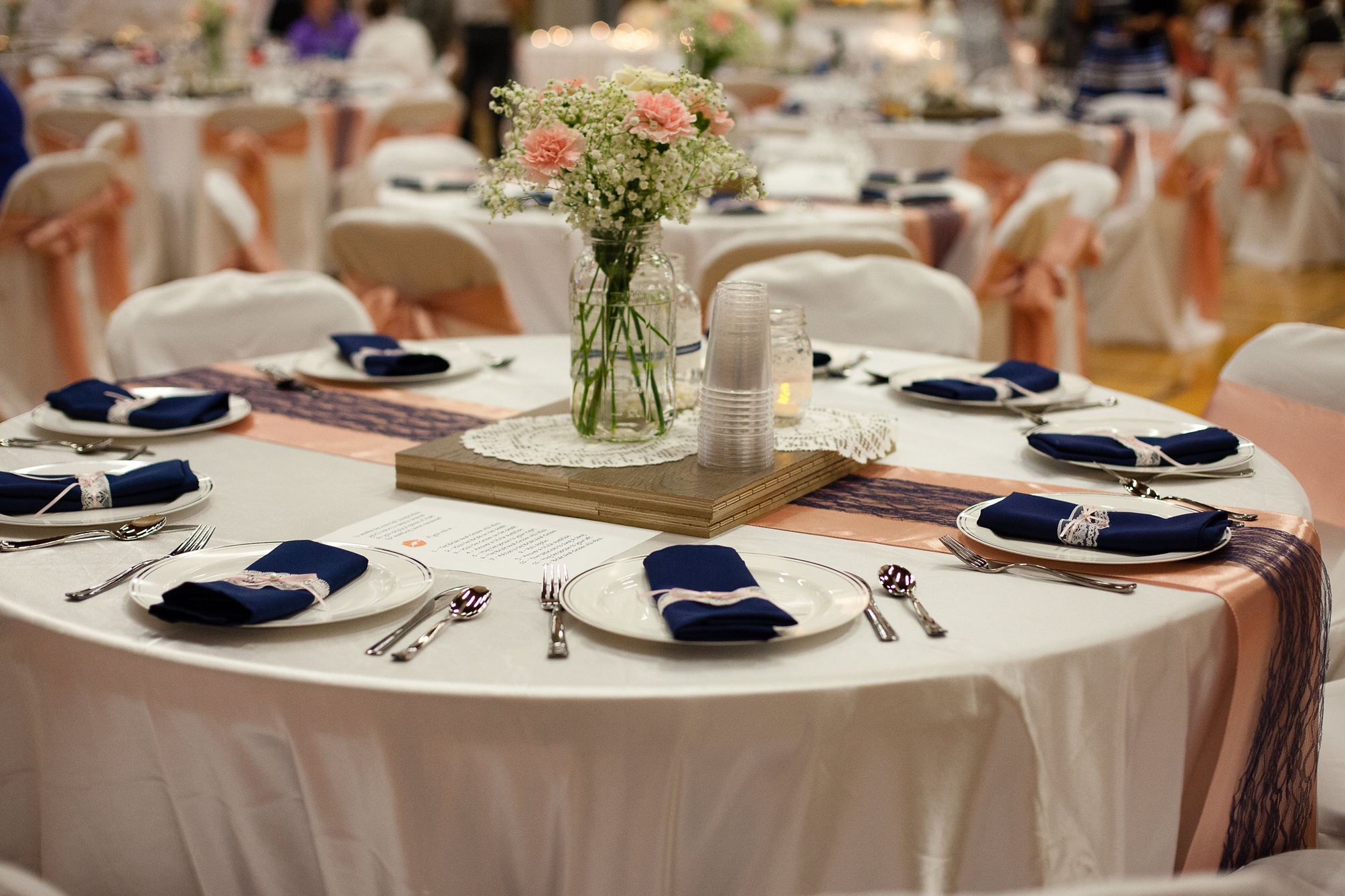 Ben and Lachelle's classy blush pink and navy blue summer wedding at the Taber Community Centre.