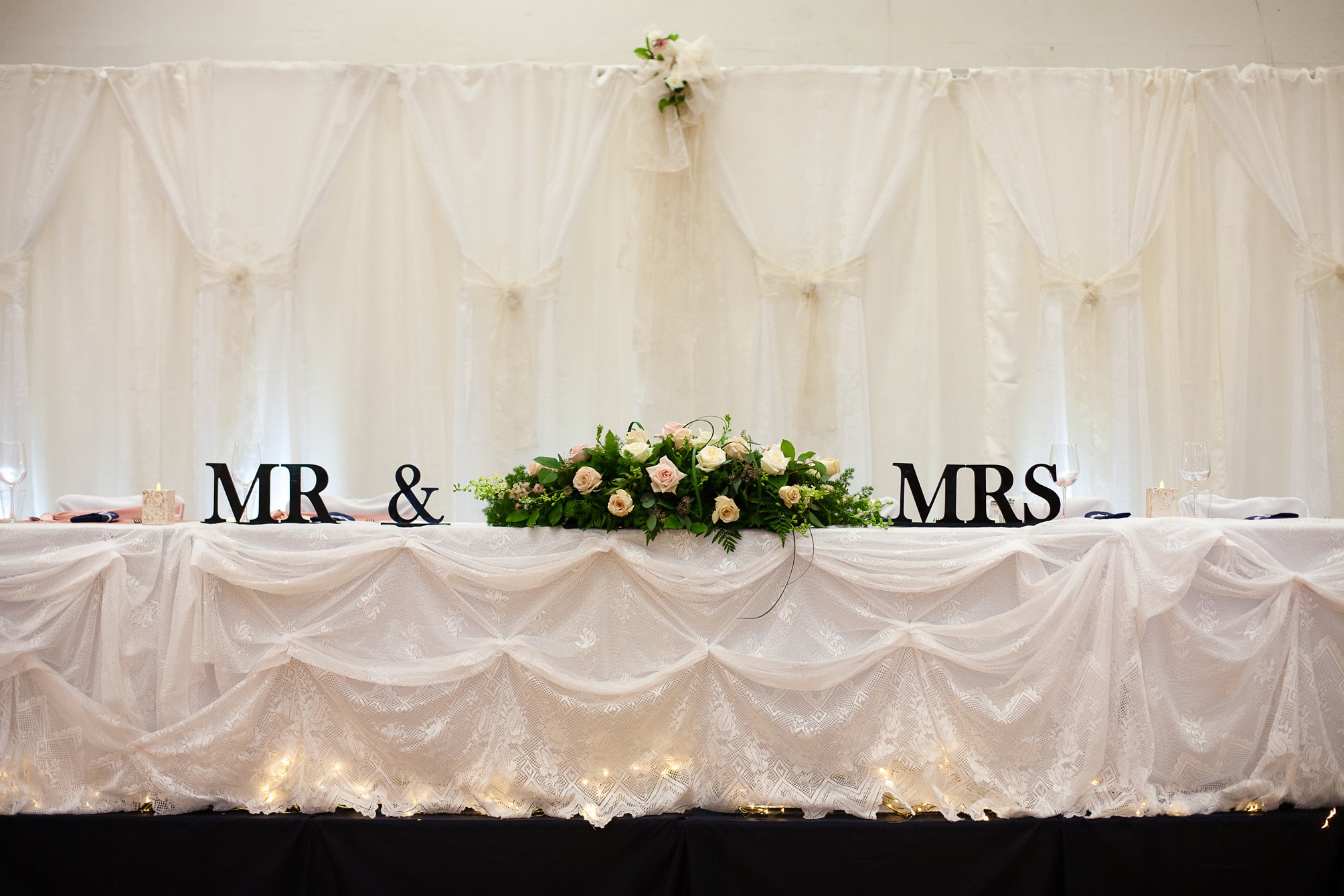 Ben and Lachelle's classy blush pink and navy blue summer wedding at the Taber Community Centre.