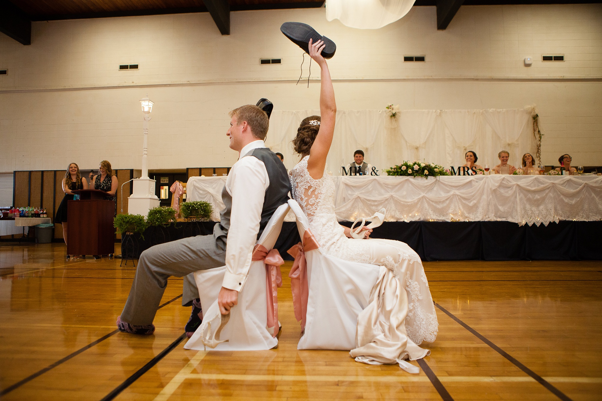 Ben and Lachelle's classy blush pink and navy blue summer wedding at the Taber Community Centre.