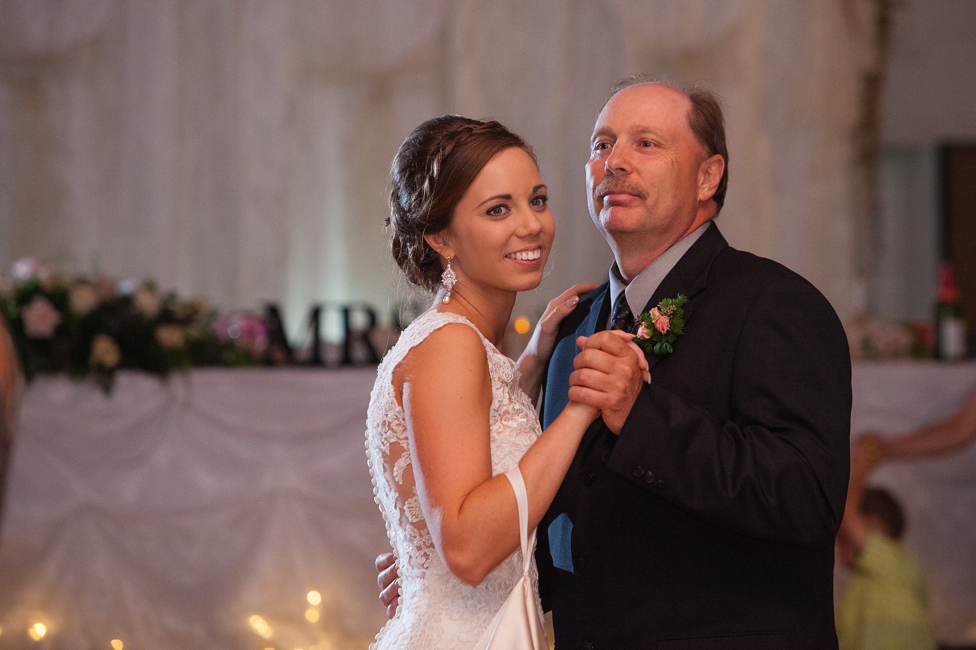 Ben and Lachelle's classy blush pink and navy blue summer wedding at the Taber Community Centre.