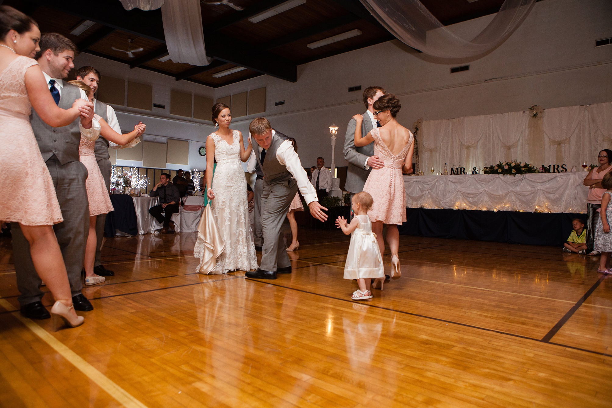 Ben and Lachelle's classy blush pink and navy blue summer wedding at the Taber Community Centre.