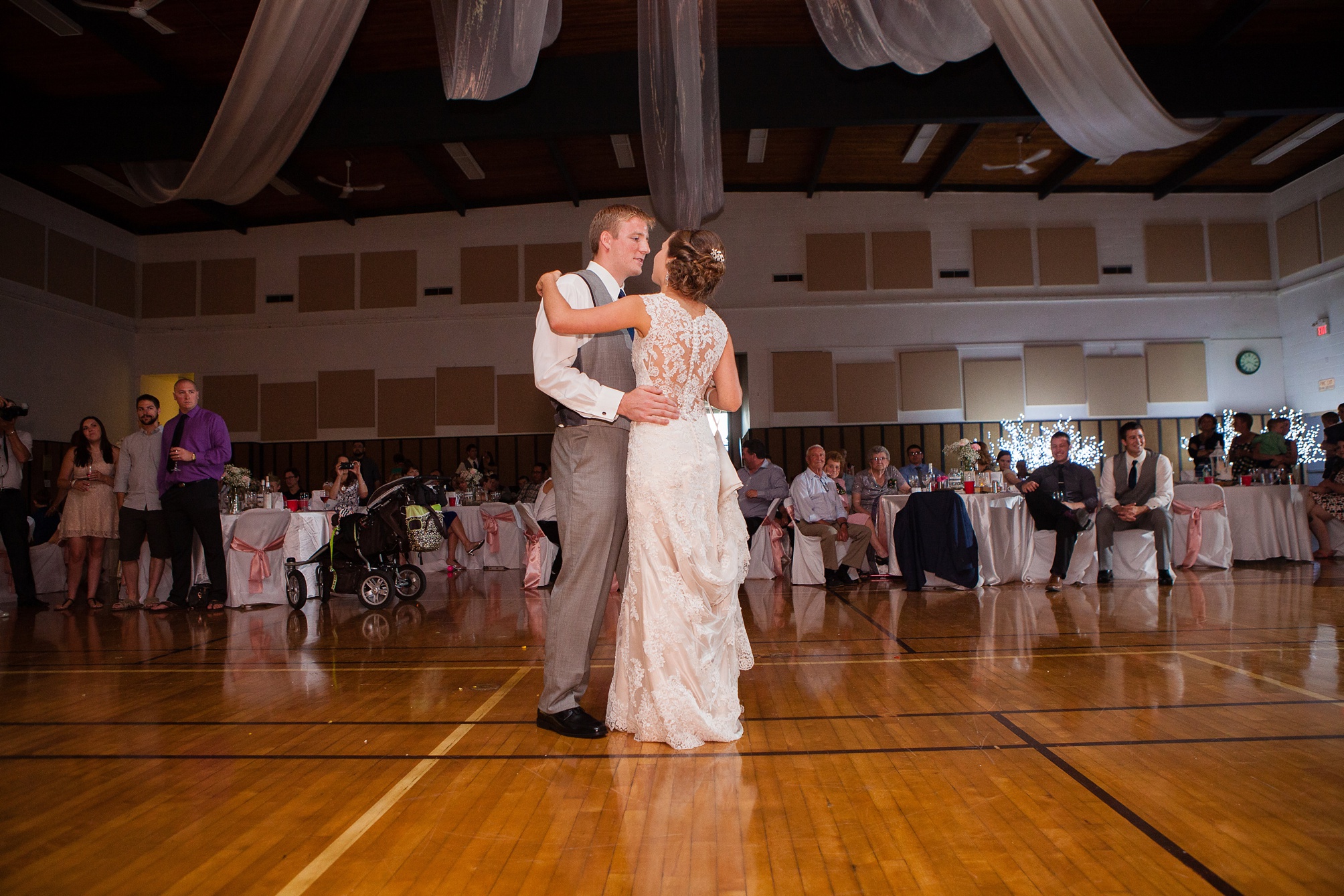 Ben and Lachelle's classy blush pink and navy blue summer wedding at the Taber Community Centre.
