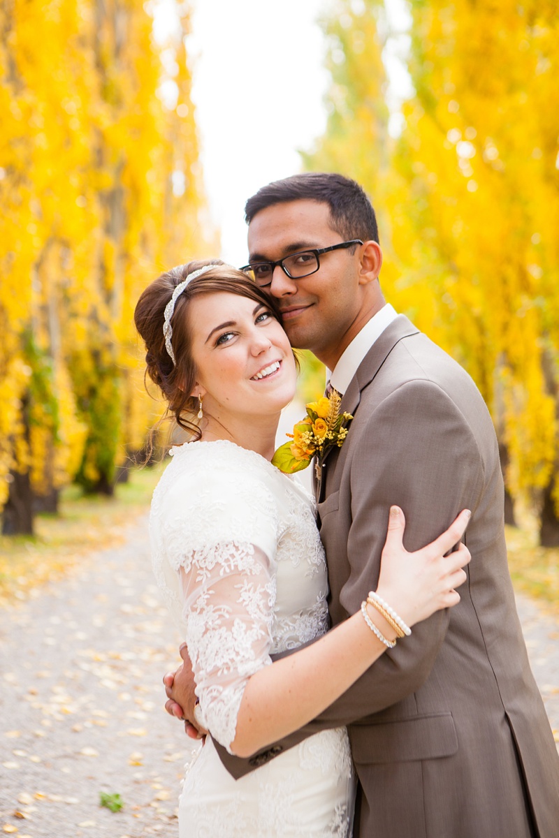 White lace dress, modest lace dress, Southern Alberta fall wedding, fall colors, Remington Carriage Centre