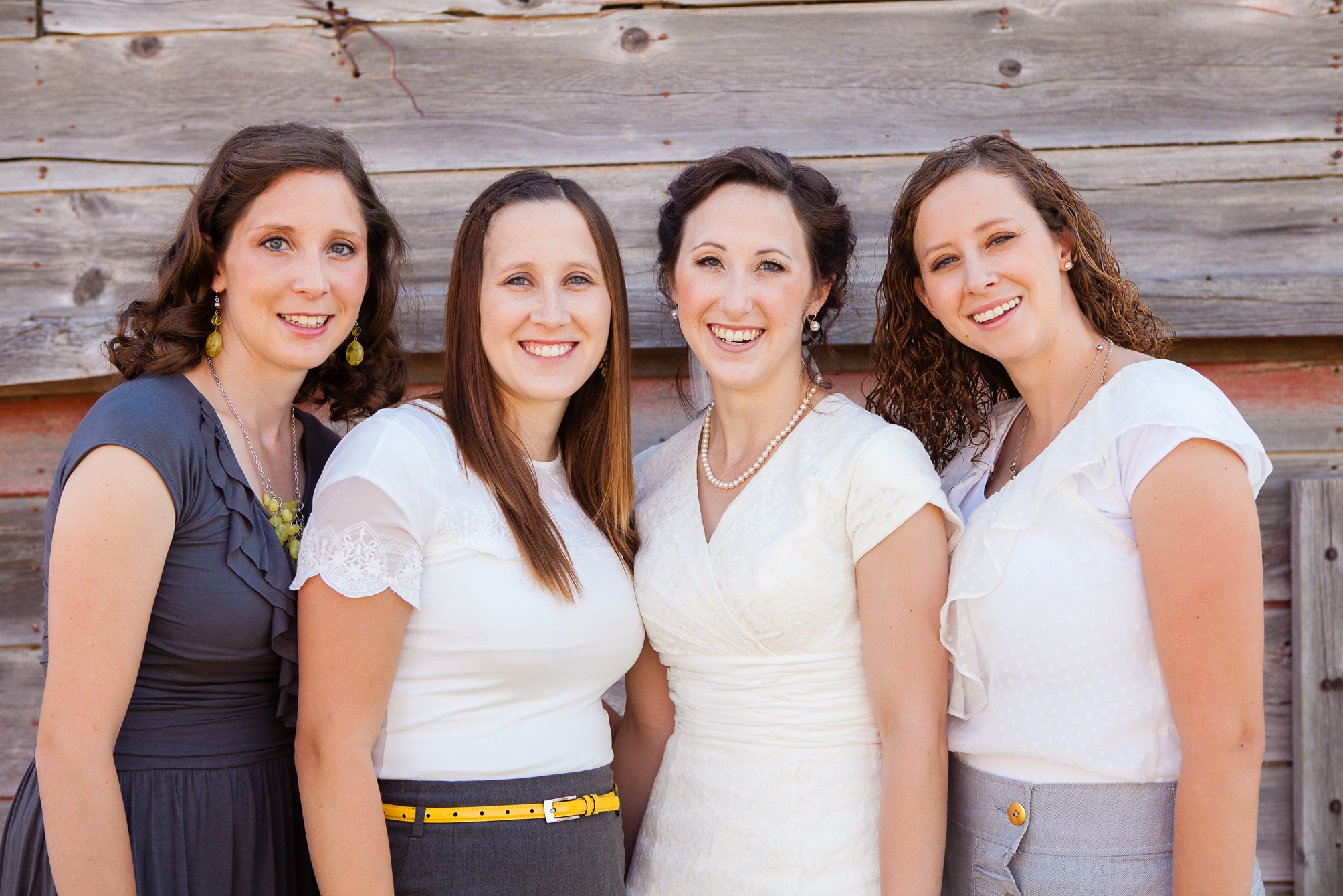 Nathan and Tannis' Cardston yellow and grey springtime Cardston temple wedding, by Kinsey Holt Photography