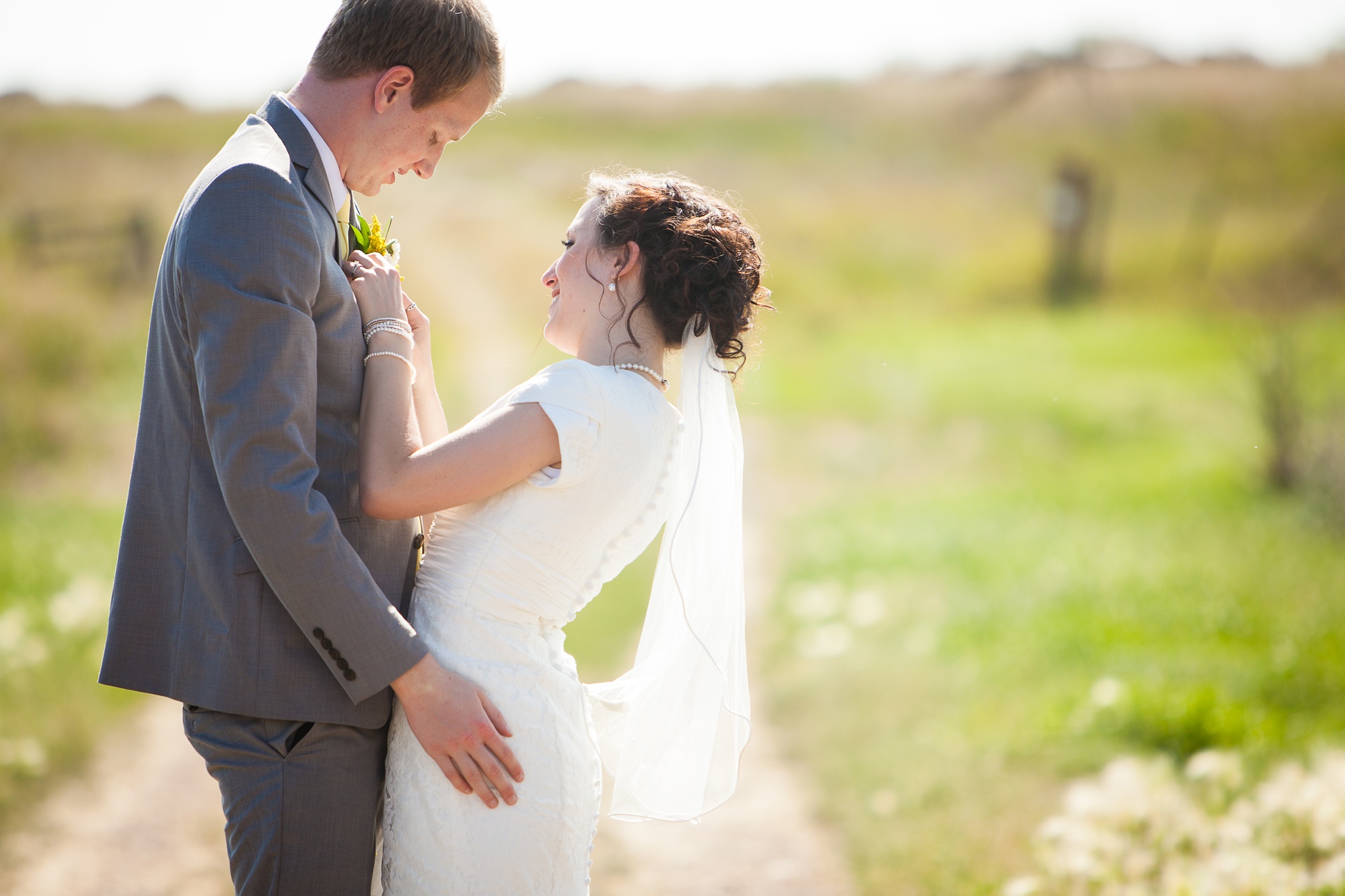 Nathan and Tannis' Cardston yellow and grey springtime Cardston temple wedding, by Kinsey Holt Photography