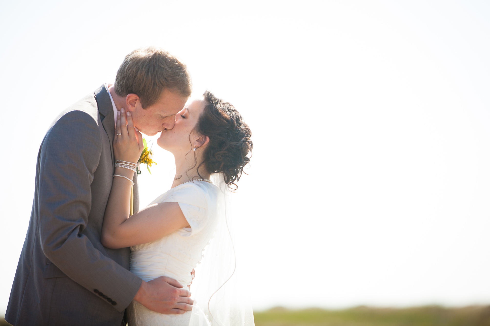 Nathan and Tannis' Cardston yellow and grey springtime Cardston temple wedding, by Kinsey Holt Photography