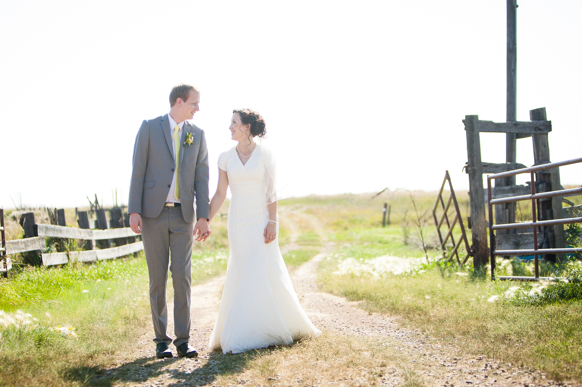 Nathan and Tannis' Cardston yellow and grey springtime Cardston temple wedding, by Kinsey Holt Photography