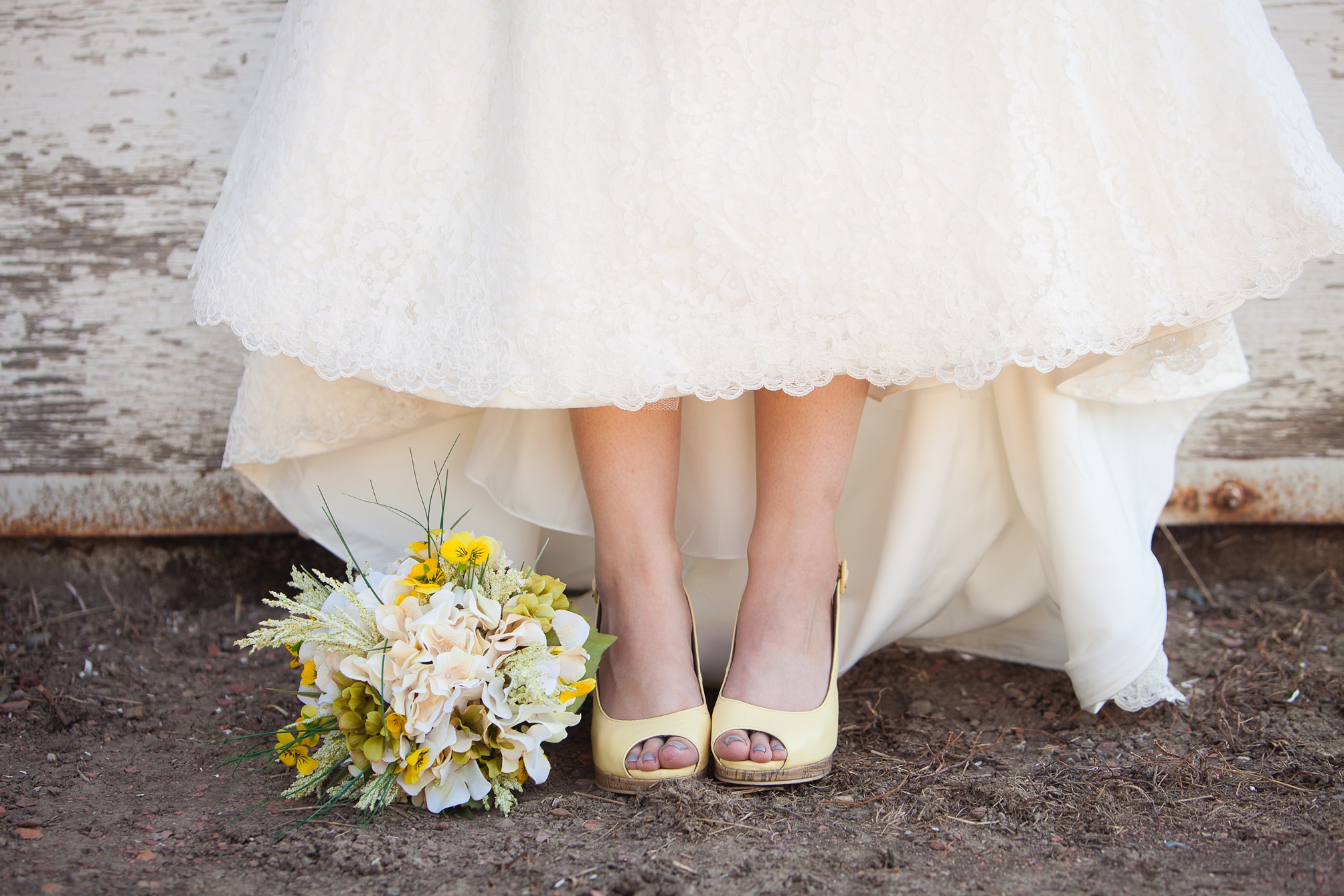 Nathan and Tannis' Cardston yellow and grey springtime Cardston temple wedding, by Kinsey Holt Photography