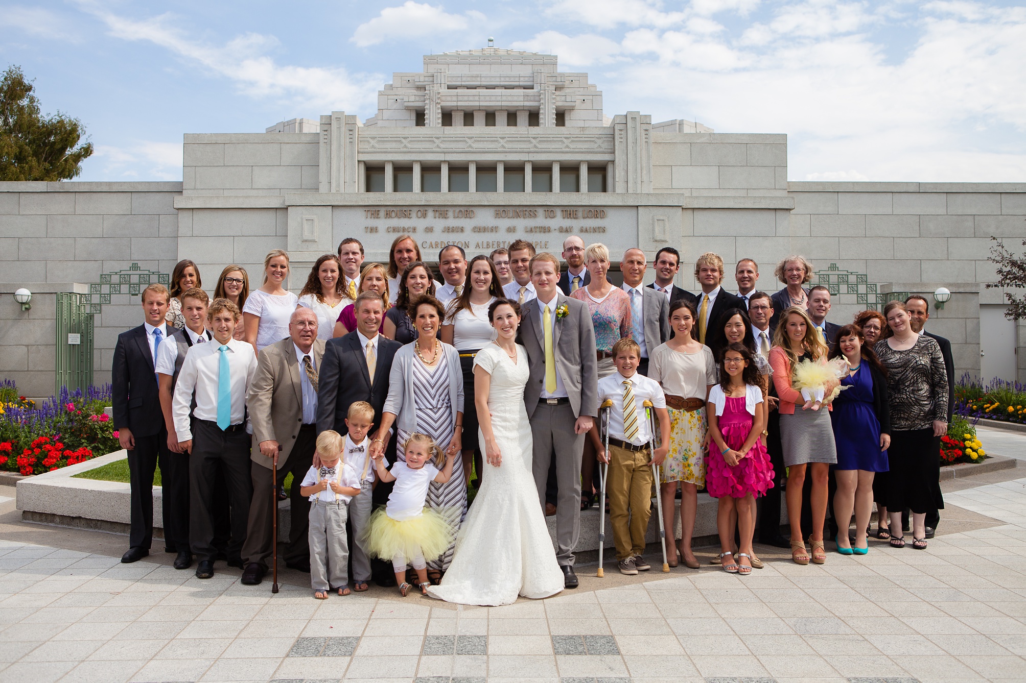 Nathan and Tannis' Cardston yellow and grey springtime Cardston temple wedding, by Kinsey Holt Photography