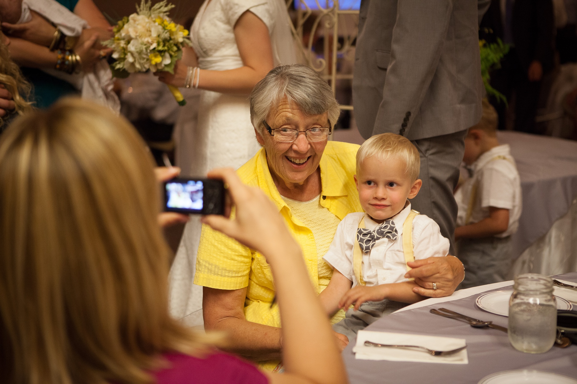 Nathan and Tannis' Cardston yellow and grey springtime Cardston temple wedding, by Kinsey Holt Photography