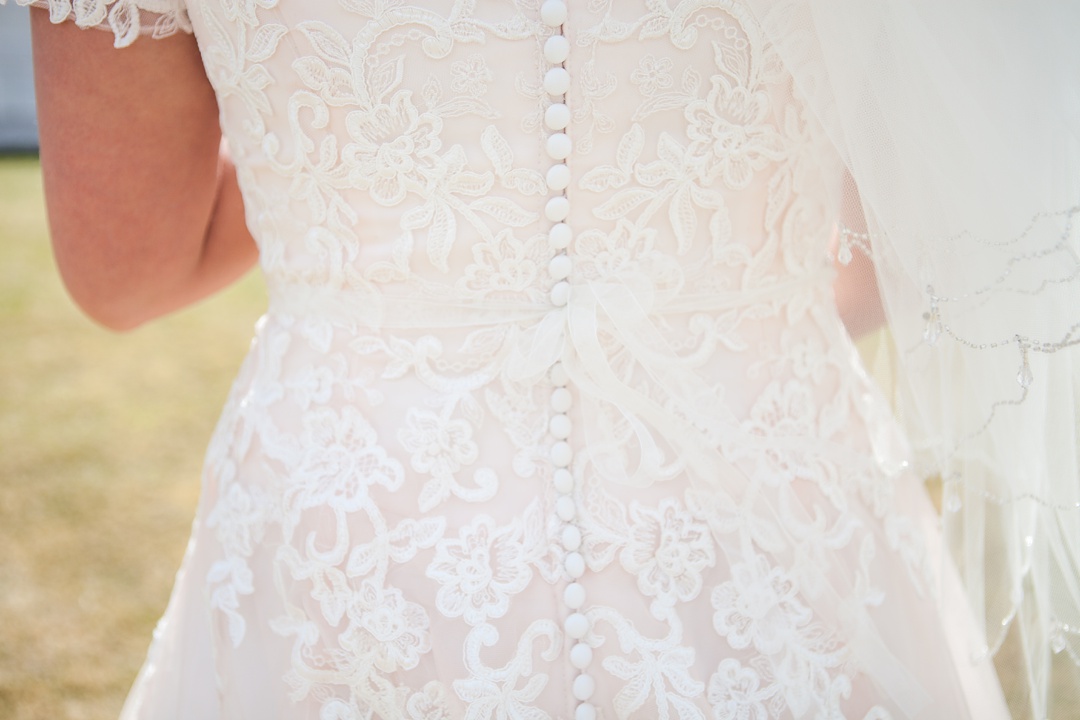 Blush pink lace wedding dress. Spring Cardston Temple wedding by Kinsey Holt Photography. Southern Alberta wedding photographer. 