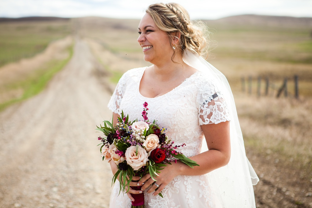 Blush pink lace wedding dress. Spring Cardston Temple wedding by Kinsey Holt Photography. Southern Alberta wedding photographer. 