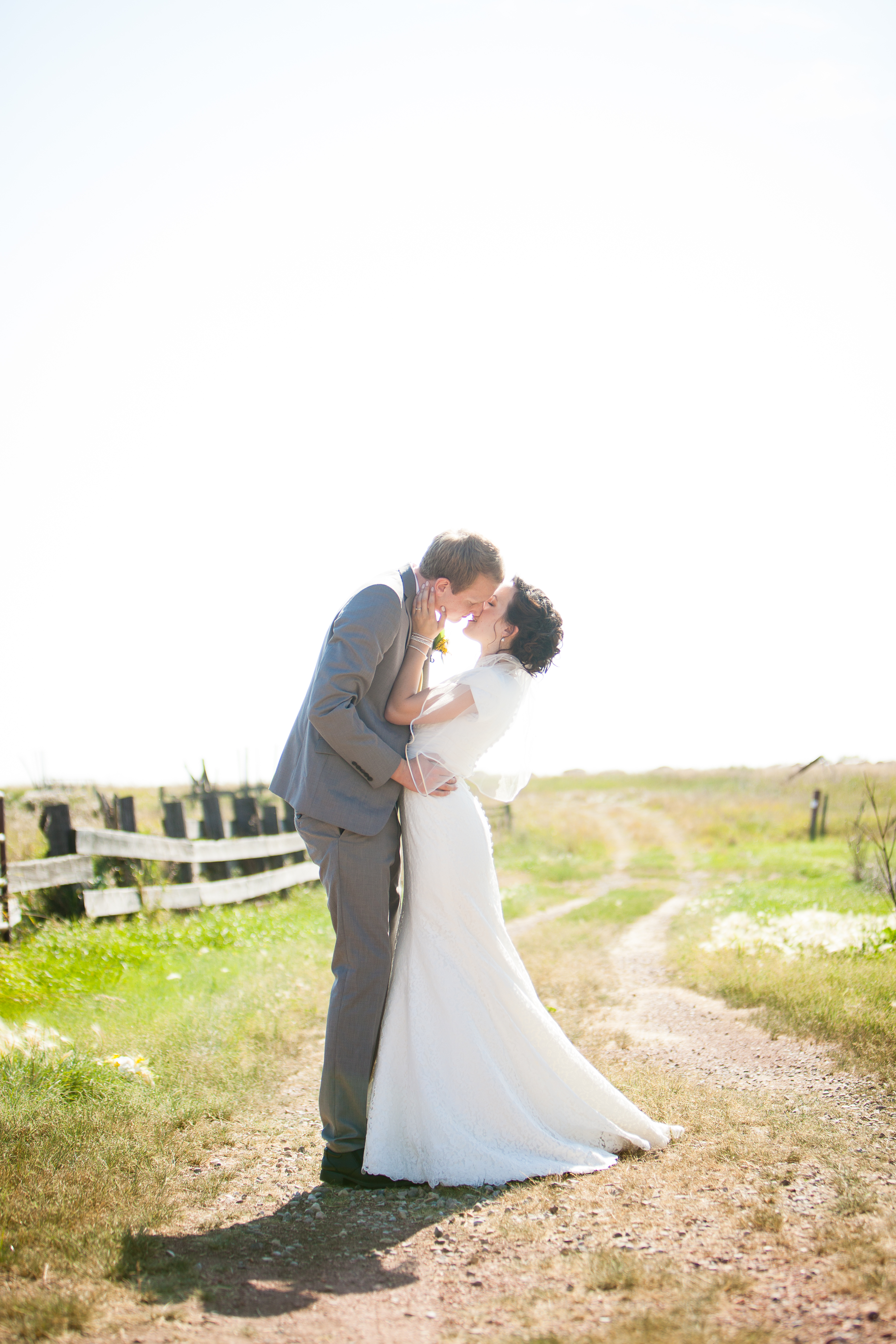 Nathan and Tannis' Cardston yellow and grey springtime Cardston temple wedding, by Kinsey Holt Photography