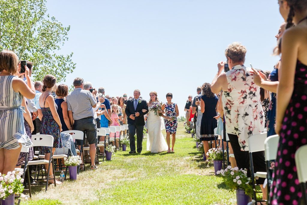 Outdoor farm wedding ceremony Getting ready Southern Alberta wedding photographer Kinsey Holt