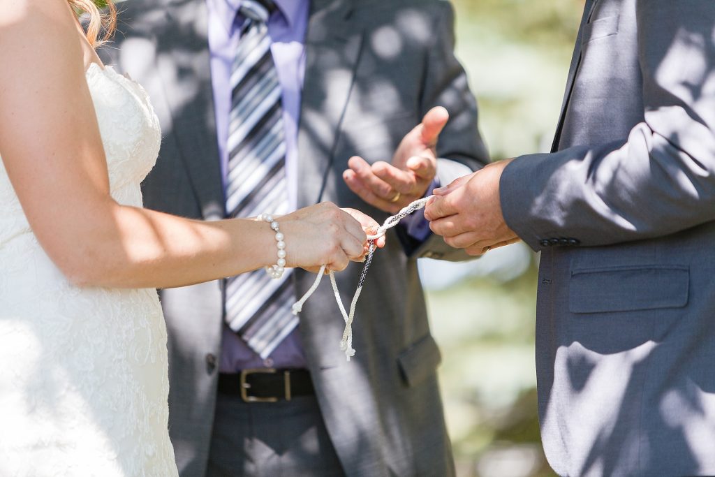 Outdoor ceremony vows Getting ready Southern Alberta wedding photographer Kinsey Holt