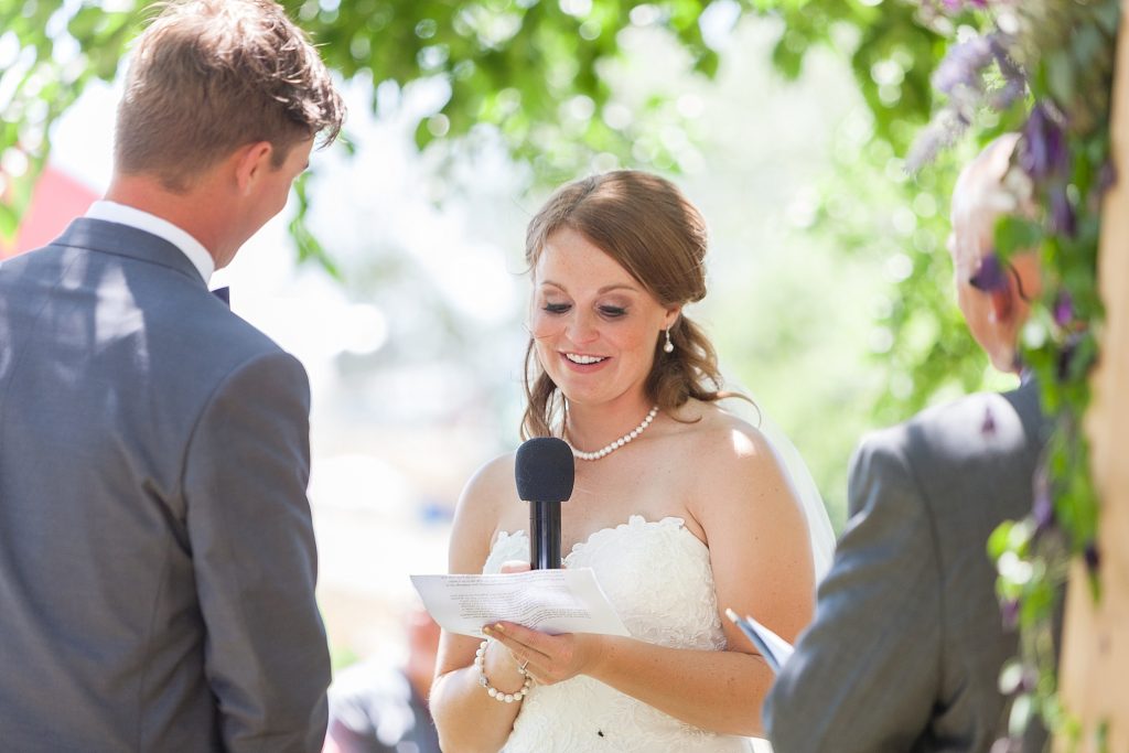 Outdoor ceremony vows Getting ready Southern Alberta wedding photographer Kinsey Holt