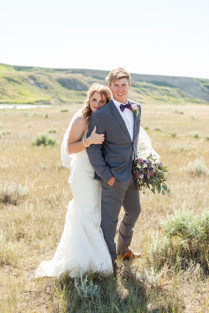 Pink and purple rose bouquet, DIY bouquet Lethbridge wedding photographer Kinsey Holt Photography