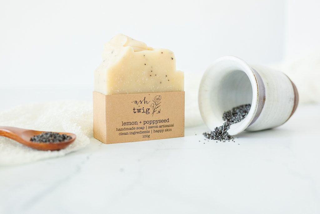 product photo of handmade soap with ingredients nearby