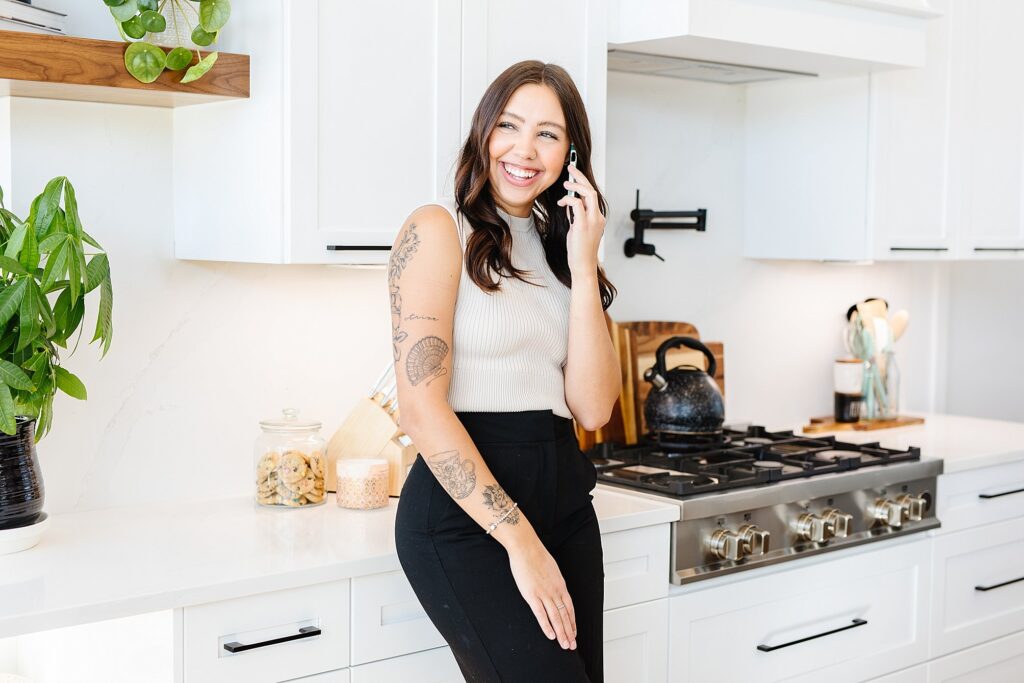 Woman talking on phone. Lethbridge brand photography by Kinsey Holt