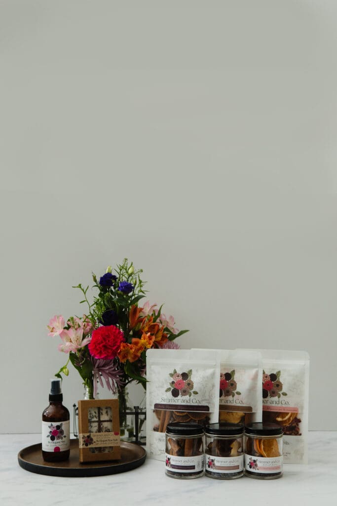 product photographer Lethbridge for Simmer and Co natural home fragrances displayed on a table